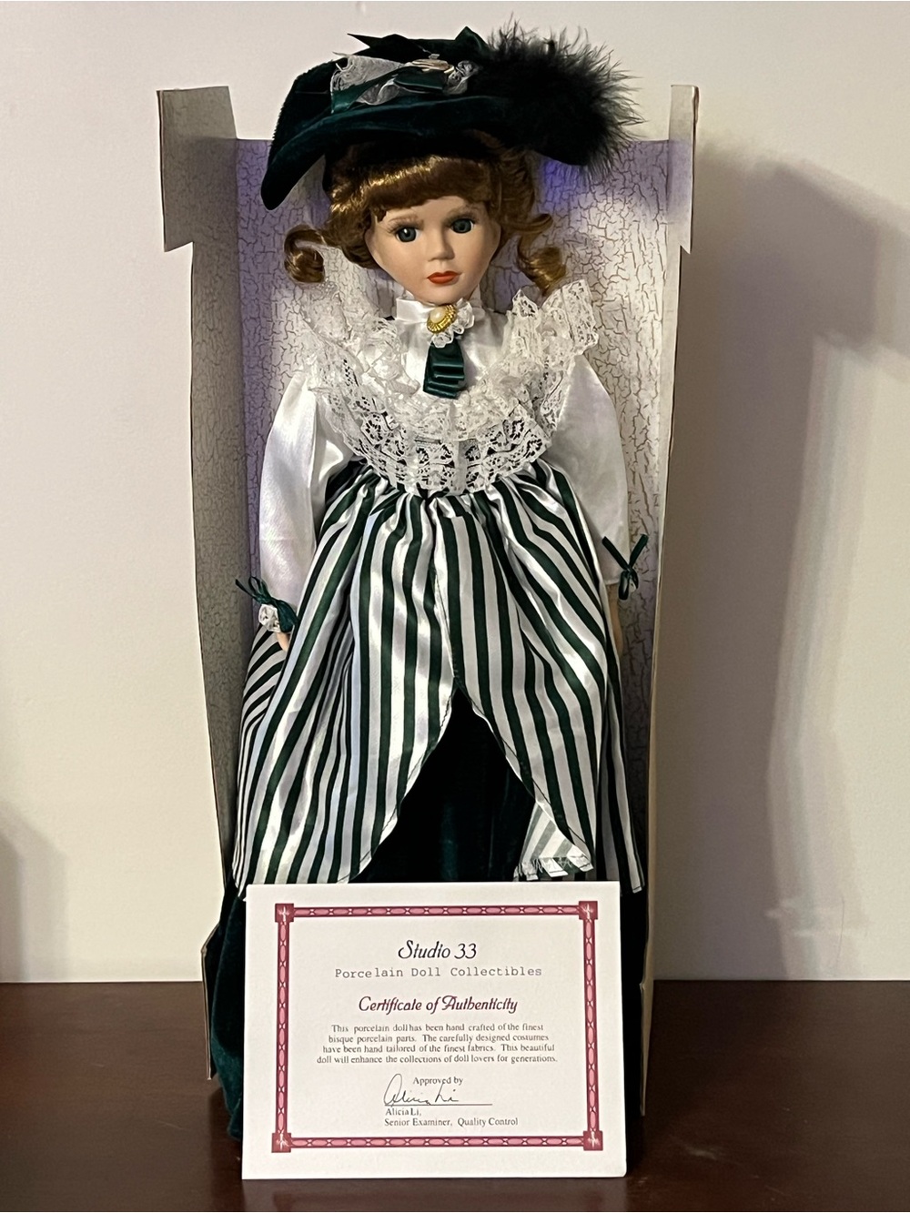 Studio Porcelain Doll in Dark Green, White & Black Striped Dress